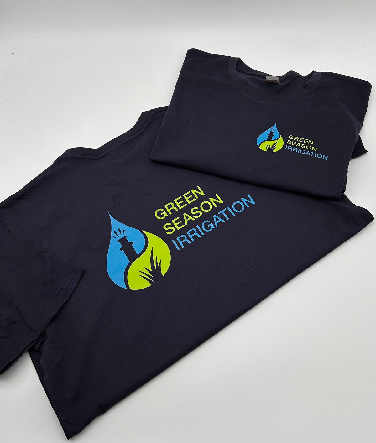 Full-colour DTF logo printing on navy t-shirts for Green Season Irrigation