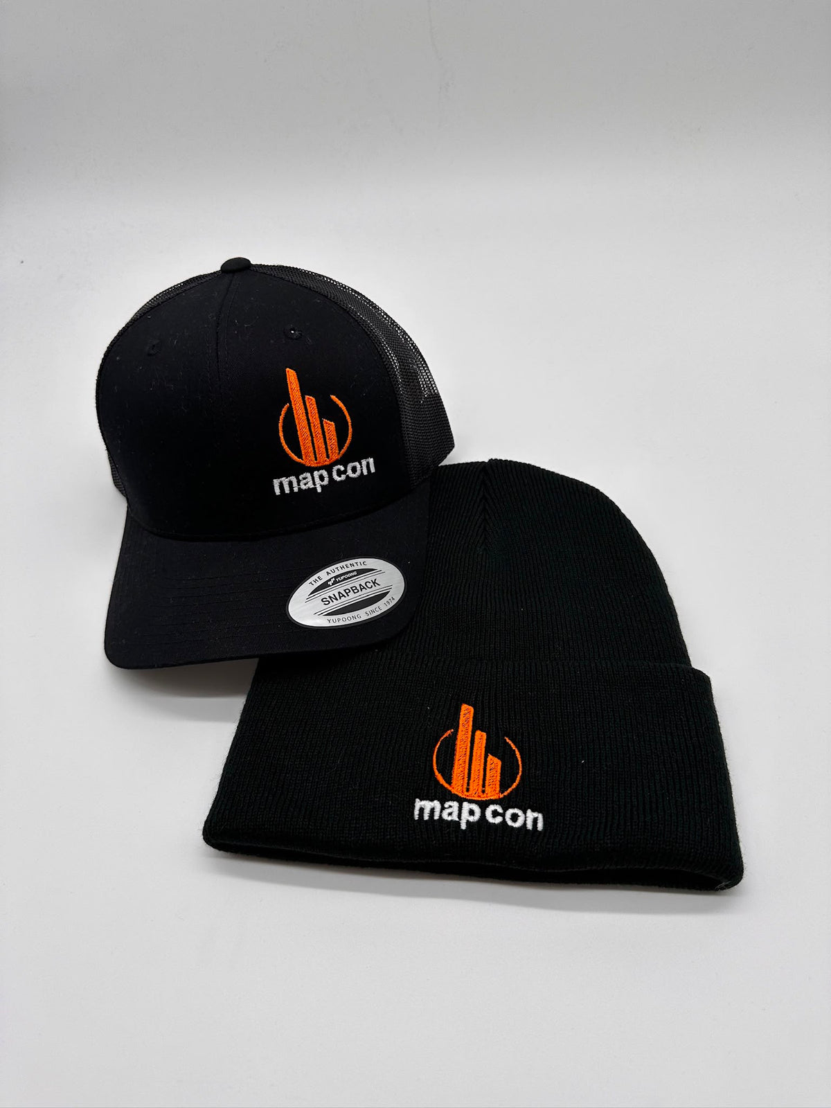 Custom logo embroidery on black hat and beanie